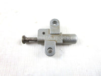 A used Tensioner Adjuster from a 2001 TRX350ES Honda OEM Part # 14540-HN5-671 for sale. Honda ATV parts… Shop our online catalog… Alberta Canada!