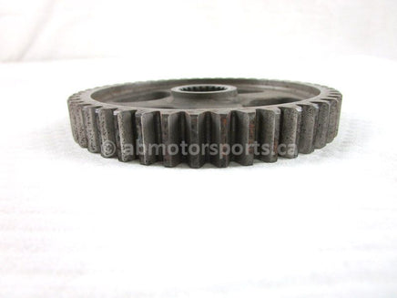 A used Front Drive Gear 46T from a 1995 TRX 300FW Honda OEM Part # 21703-HM5-730 for sale. Honda ATV parts… Shop our online catalog… Alberta Canada!