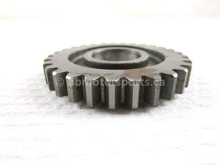 A used Kick Starter Gear 29T from a 2004 CRF150F Honda OEM Part # 28211-KPT-900 for sale. Honda dirt bike online? Oh, Yes! Find parts that fit your unit here!