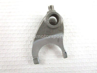A used Gearshift Fork R from a 2004 CRF150F Honda OEM Part # 24211-KPT-900 for sale. Honda dirt bike online? Oh, Yes! Find parts that fit your unit here!