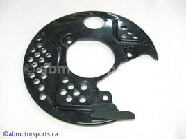 Used Kawasaki Bayou 400 OEM Part # 55020-1304 left disc brake cover for sale