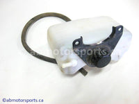 Used Kawasaki Bayou 400 OEM Part # 43078-1146 coolant reservoir for sale