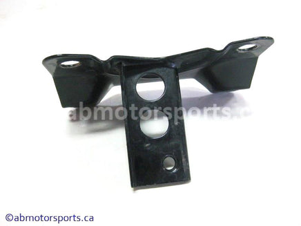 Used Kawasaki Bayou 400 OEM Part # 11047-1583 brake line support for sale