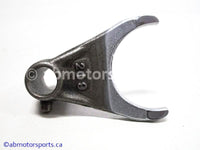 Used Kawasaki Dirt Bike KX 125 OEM part # 13140-1253 shift fork for sale
