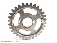 Used Kawasaki Dirt Bike KX 125 OEM part # 59051-1365 idler spur gear for sale