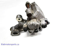 Used Kawasaki Dirt Bike KX 125 OEM part # 43041-1687 rear brake caliper for sale