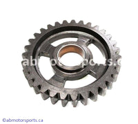 Used Kawasaki Dirt Bike KX 125 OEM part # 13260-1752 low output transmission gear for sale