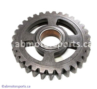 Used Kawasaki Dirt Bike KX 125 OEM part # 13260-1752 low output transmission gear for sale