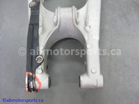 Used Kawasaki Dirt Bike KX 125 OEM part # 33001-1556-TX swing arm for sale