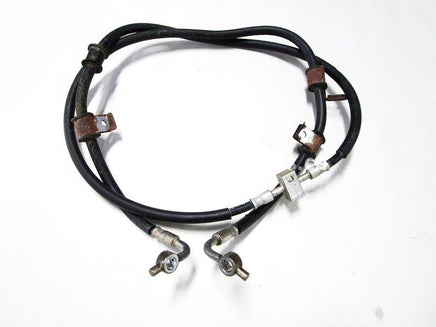 Used 2009 Kawasaki Teryx 750 LE OEM part # 43095-0429 front brake line for sale