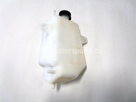 Used 2009 Kawasaki Teryx 750 LE OEM part # 43078-0041 coolant reservoir for sale