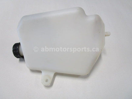 Used 2009 Kawasaki Teryx 750 LE OEM part # 43078-0041 coolant reservoir for sale