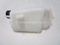 Used 2009 Kawasaki Teryx 750 LE OEM part # 43078-0041 coolant reservoir for sale