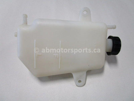 Used 2009 Kawasaki Teryx 750 LE OEM part # 43078-0041 coolant reservoir for sale