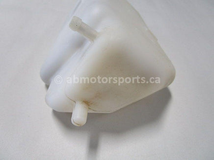 Used 2009 Kawasaki Teryx 750 LE OEM part # 43078-0041 coolant reservoir for sale