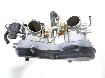 Used 2009 Kawasaki Teryx 750 LE OEM part # 16163-0137 throttle body for sale