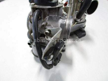Used 2009 Kawasaki Teryx 750 LE OEM part # 16163-0137 throttle body for sale