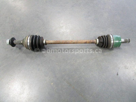 Used 2009 Kawasaki Teryx 750 LE OEM part # 59266-0028 front axle for sale