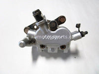 Used 2009 Kawasaki Teryx 750 LE OEM part # 43080-0079 front left brake caliper for sale
