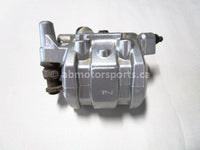 Used 2009 Kawasaki Teryx 750 LE OEM part # 43080-0079 front left brake caliper for sale
