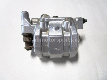 Used 2009 Kawasaki Teryx 750 LE OEM part # 43080-0079 front left brake caliper for sale