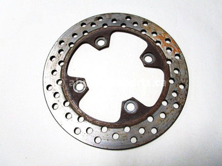 Used 2009 Kawasaki Teryx 750 LE OEM part # 41080-0156 front brake disc for sale