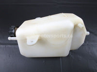 A used Coolant Reservoir from a 2009 TERYX 750LE Kawasaki OEM Part # 43078-0041 for sale. Looking for Kawasaki parts near Edmonton? We ship daily across Canada!