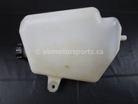 A used Coolant Reservoir from a 2009 TERYX 750LE Kawasaki OEM Part # 43078-0041 for sale. Looking for Kawasaki parts near Edmonton? We ship daily across Canada!