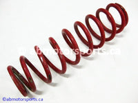 Used Polaris ATV OUTLAW 500 OEM part # 7043197-293 front shock spring for sale