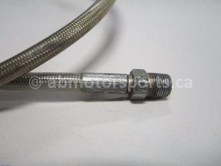 Used Polaris Snowmobile TRAIL RMK OEM part # 1910613 braided brake line for sale