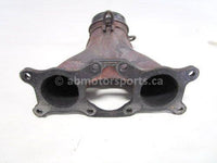 Used 2013 Polaris RMK PRO 800 Snowmobile OEM part # 1262107-029 exhaust manifold for sale