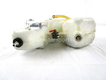 A used Oil Tank from a 2000 RMK 600 Polaris OEM Part # 1253353 for sale. Check out our online catalog for more parts that will fit your unit!
