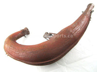 A used Tuned Pipe from a 2000 RMK 600 Polaris OEM Part # 1261028 for sale. Check out our online catalog for more parts that will fit your unit!