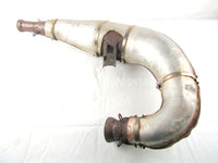 A used Tuned Pipe from a 2000 RMK 600 Polaris OEM Part # 1261028 for sale. Check out our online catalog for more parts that will fit your unit!