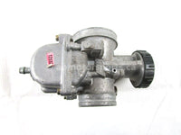 A used Carburetor from a 1998 700 RMK Polaris OEM Part # 1253208 for sale. Online Polaris snowmobile parts in Alberta, shipping daily across Canada!