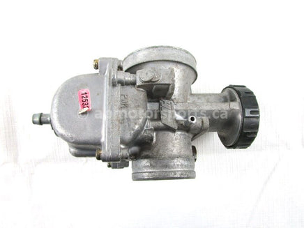 A used Carburetor from a 1998 700 RMK Polaris OEM Part # 1253208 for sale. Online Polaris snowmobile parts in Alberta, shipping daily across Canada!