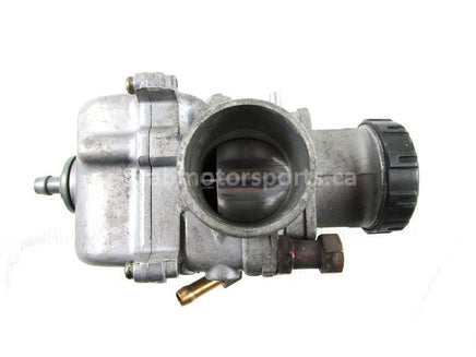 A used Carburetor from a 1998 700 RMK Polaris OEM Part # 1253208 for sale. Online Polaris snowmobile parts in Alberta, shipping daily across Canada!