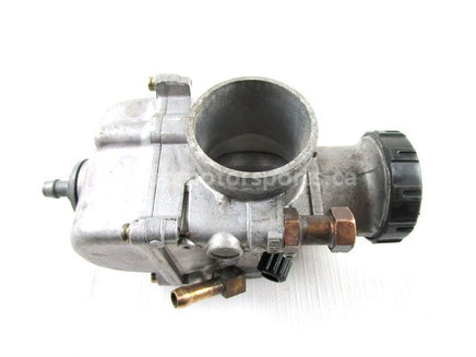 A used Carburetor from a 1998 RMK 700 Polaris OEM Part # 1253208 for sale. Online Polaris snowmobile parts in Alberta, shipping daily across Canada!