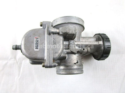 A used Carburetor from a 1998 RMK 700 Polaris OEM Part # 1253208 for sale. Online Polaris snowmobile parts in Alberta, shipping daily across Canada!