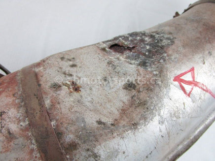 A used Tuned Pipe from a 1998 RMK 700 Polaris OEM Part # 1260764 for sale. Online Polaris snowmobile parts in Alberta, shipping daily across Canada!