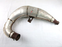 A used Tuned Pipe from a 1998 RMK 700 Polaris OEM Part # 1260764 for sale. Online Polaris snowmobile parts in Alberta, shipping daily across Canada!