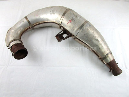 A used Tuned Pipe from a 1998 RMK 700 Polaris OEM Part # 1260764 for sale. Online Polaris snowmobile parts in Alberta, shipping daily across Canada!