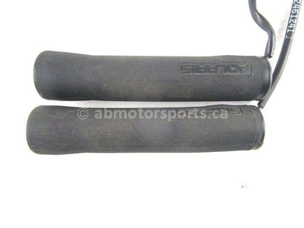 A used Handlebar Grips from a 2006 FST CLASSIC 750 Polaris OEM Part # 5434715-070 for sale. Check out Polaris snowmobile parts in our online catalog!