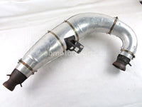 A used Tuned Pipe from a 1998 RMK 700 Polaris OEM Part # 1260764 for sale. Check out Polaris snowmobile parts in our online catalog!