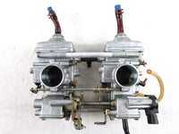 A used Carburetor Assy from a 2001 RMK 800 Polaris OEM Part # 1253385 for sale. Check out Polaris snowmobile parts in our online catalog!