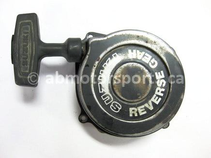 Used Suzuki LT 230 OEM part # 18100-18A10 starter recoil for sale