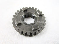 A used Third Driven Gear 26T from a 2004 QUAD SPORT Z400 Suzuki OEM Part # 24331-07G00 for sale. Shipping Suzuki parts across Canada daily!