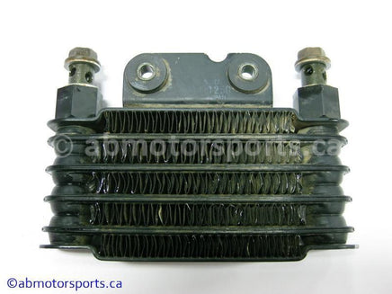 Used Suzuki Dirt Bike DR Z250 OEM part # 16600-13E00 oil cooler for sale