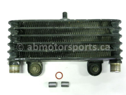 Used Yamaha ATV KODIAK 400 OEM part # 4GB-13470-00-00 oil cooler assembly for sale