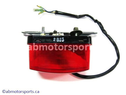 Used Yamaha ATV GRIZZLY 660 OEM part # 5KM-84710-00-00 tail light for sale